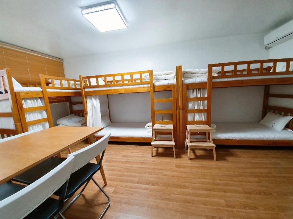 Postel nebo postele na pokoji v ubytování Byulbam Guesthouse