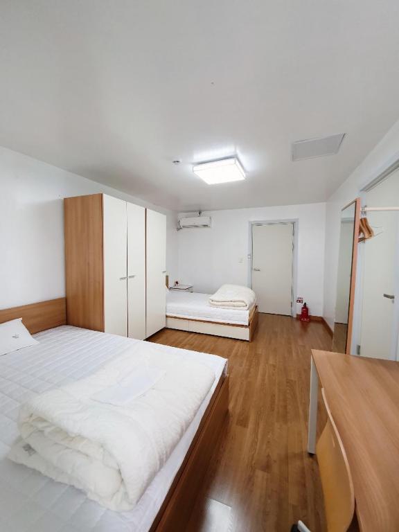 Postel nebo postele na pokoji v ubytování Byulbam Guesthouse