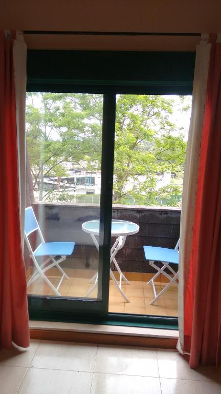 Balkón alebo terasa v ubytovaní Apartamento primera línea playa d samil