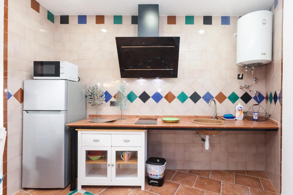 A kitchen or kitchenette at Casa Larga