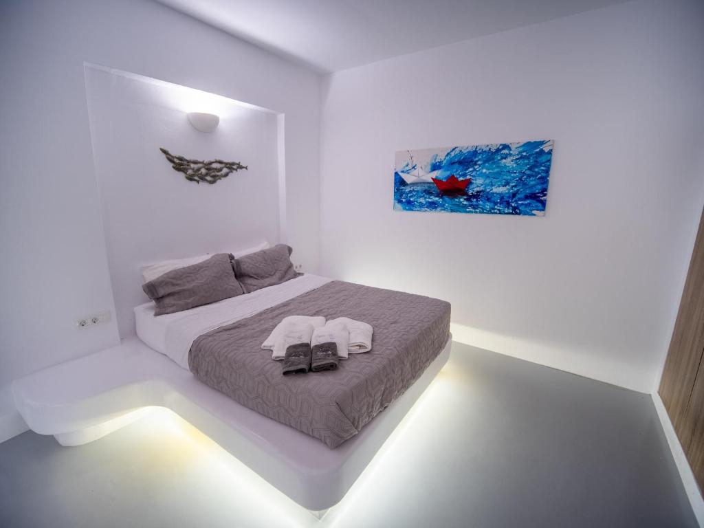 Postel nebo postele na pokoji v ubytování Majestic Sky Luxury Suites