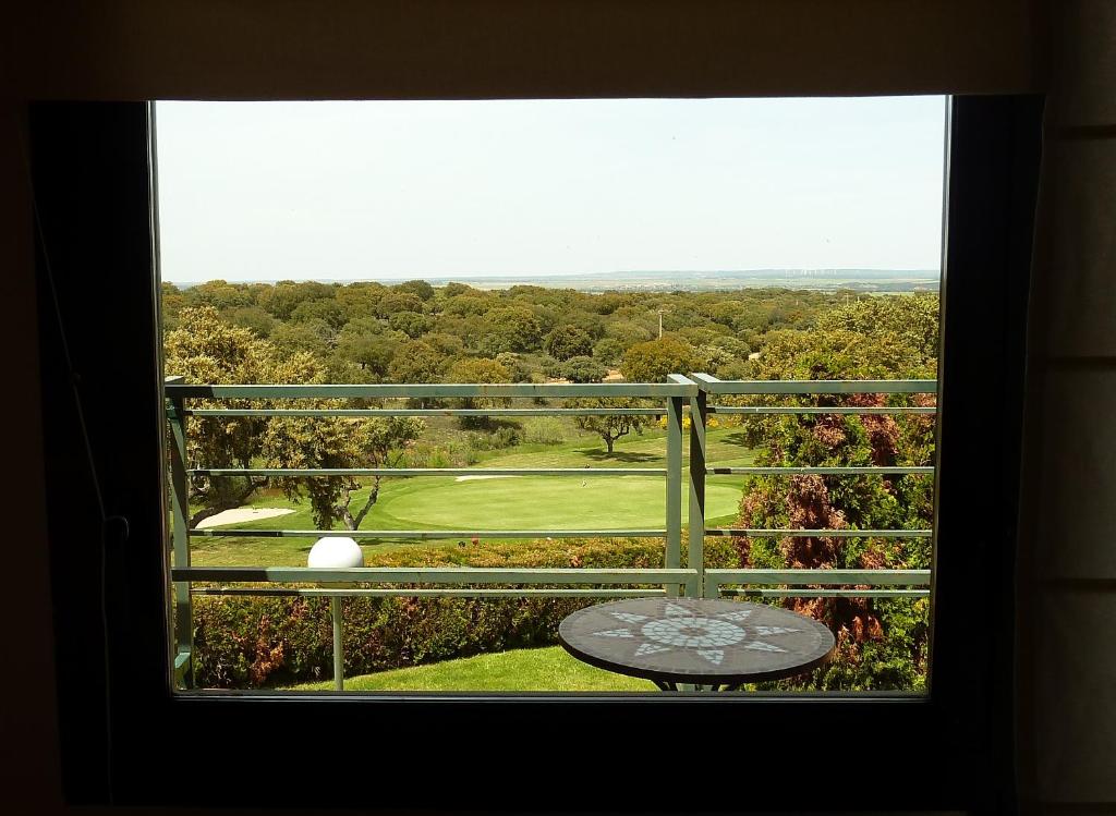 a view from a window of a golf course at Estudio con Wifi y vistas al Campo de Golf de Salamanca in San Pedro del Valle