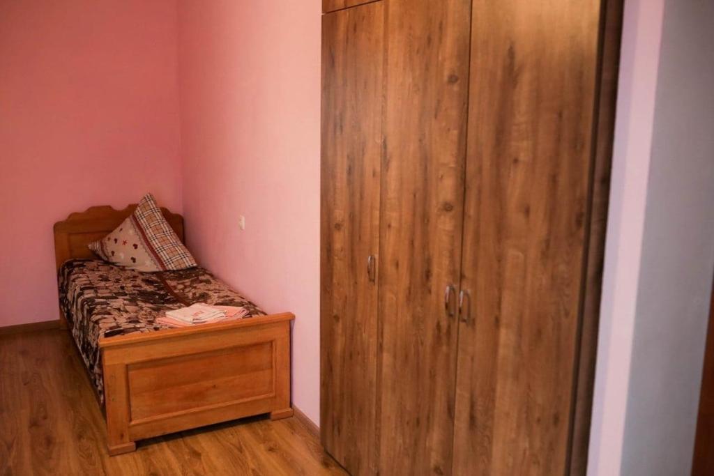 Postel nebo postele na pokoji v ubytování Дідів Рай