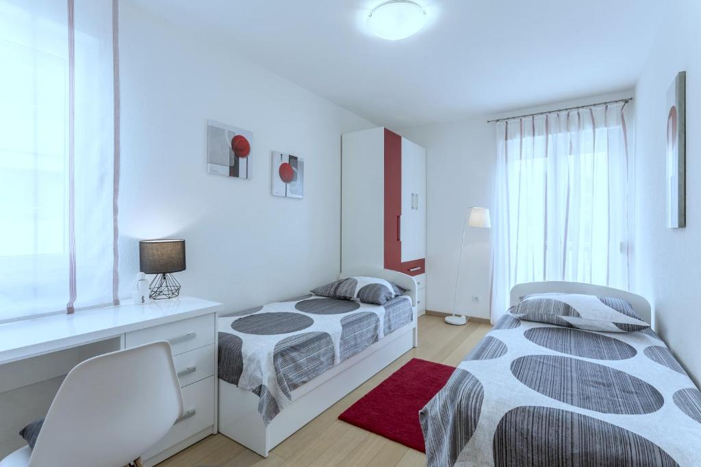 Posteľ alebo postele v izbe v ubytovaní Iris beach apartments