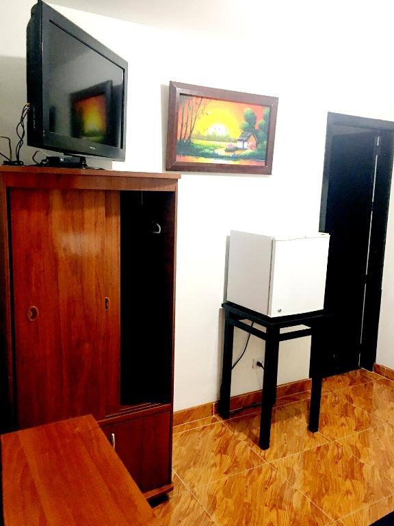 TV a/nebo společenská místnost v ubytování Hotel Casa Paulina