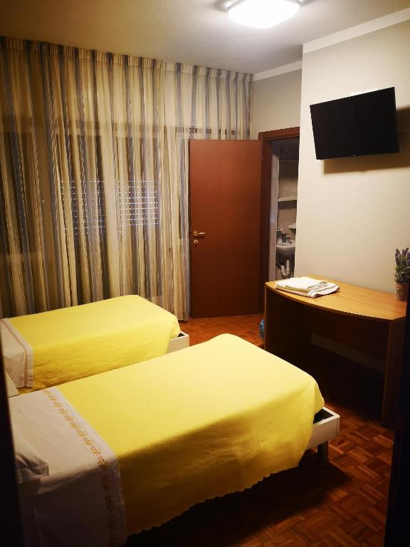 Postel nebo postele na pokoji v ubytování l'igloo b&b