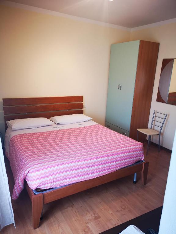 Postel nebo postele na pokoji v ubytování l'igloo b&b