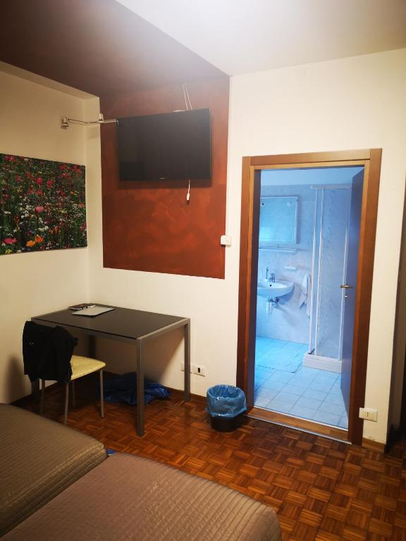 TV a/nebo společenská místnost v ubytování l'igloo b&b