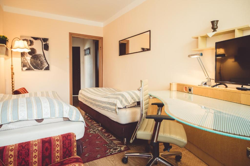 Postel nebo postele na pokoji v ubytování OW Mikomania
