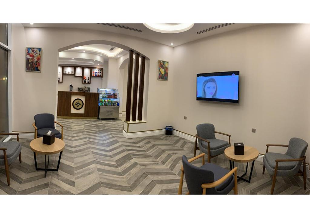 TV a/nebo společenská místnost v ubytování فندق قوبا إن - Quba Inn Hotel