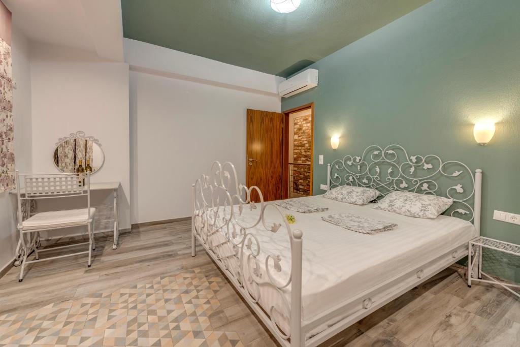 Posteľ alebo postele v izbe v ubytovaní Harmony Deluxe Villas