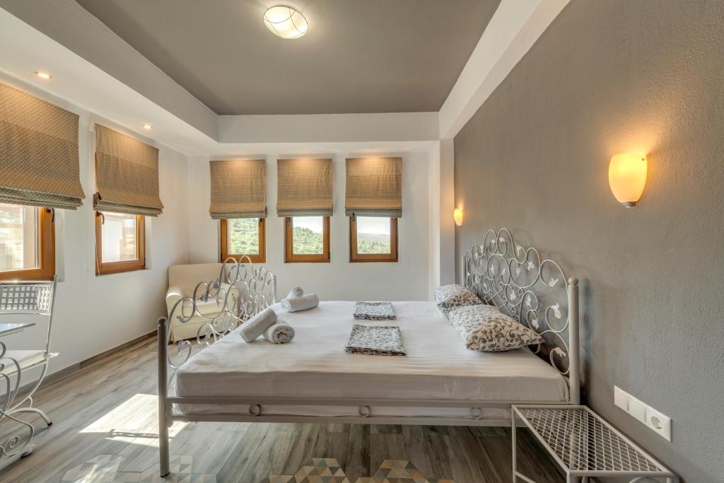 Posteľ alebo postele v izbe v ubytovaní Harmony Deluxe Villas
