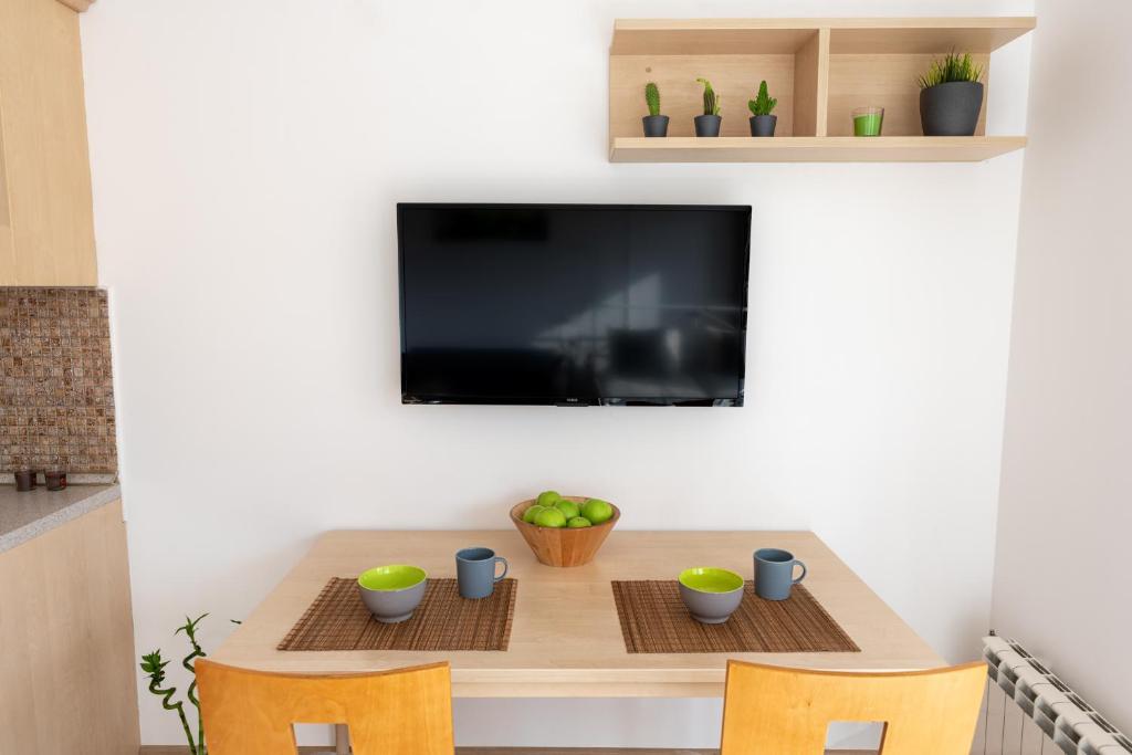 TV a/nebo společenská místnost v ubytování Studio Talisman II