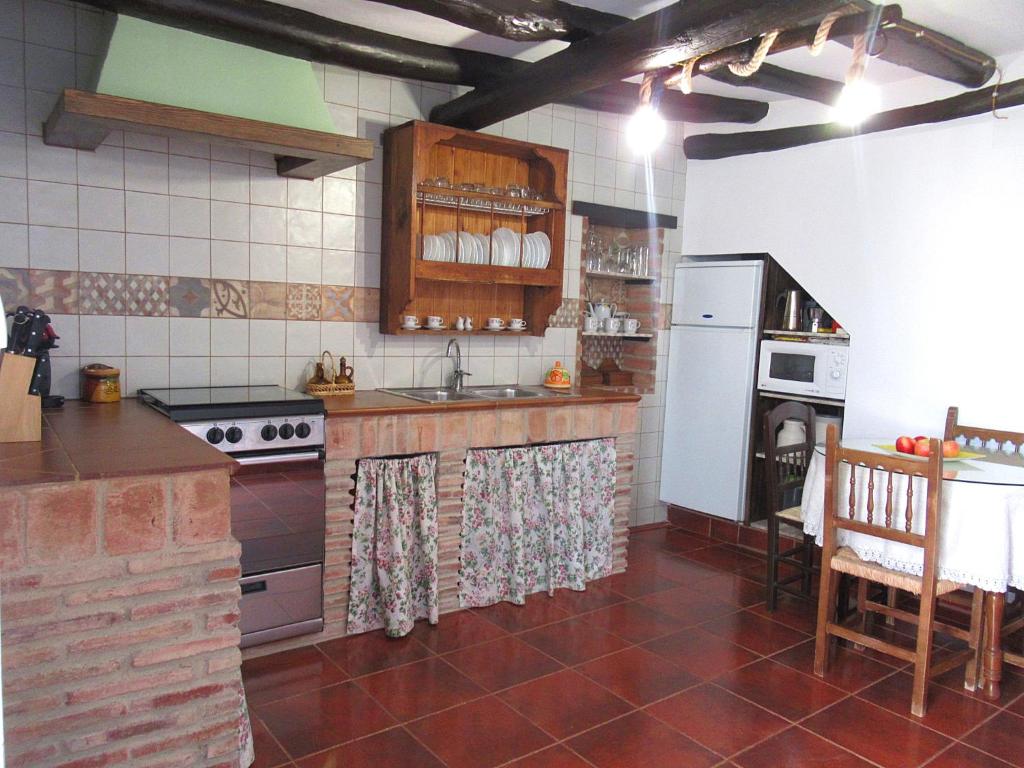 Kuchyň nebo kuchyňský kout v ubytování Casa Rural Dolores