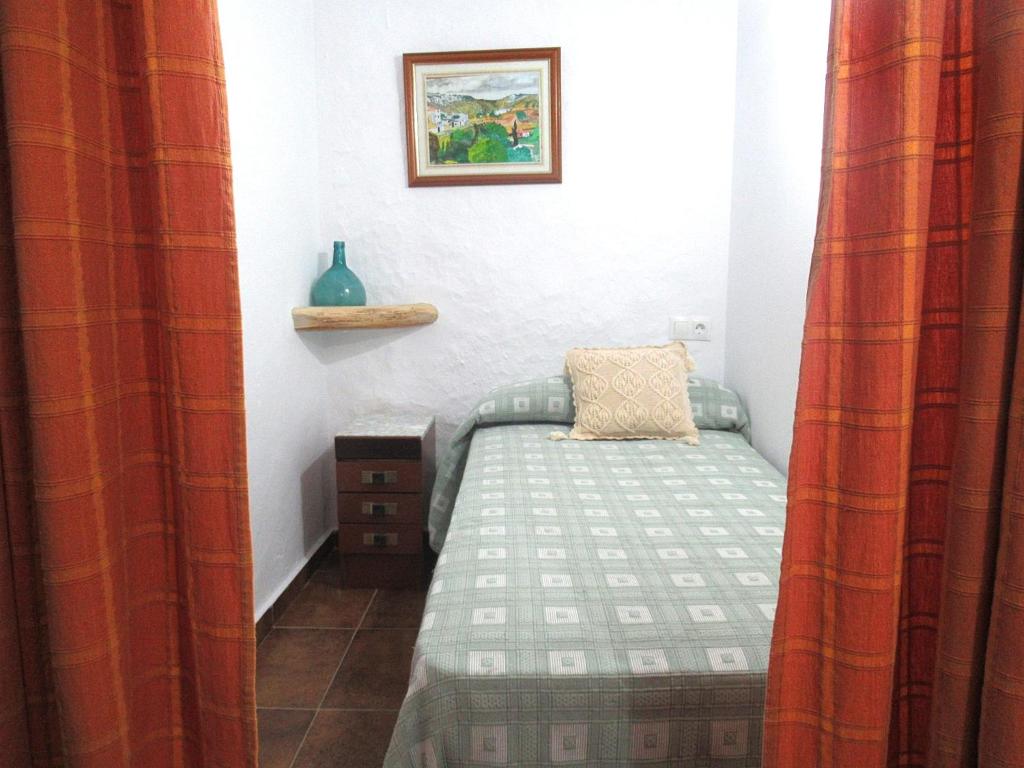 Postel nebo postele na pokoji v ubytování Casa Rural Dolores
