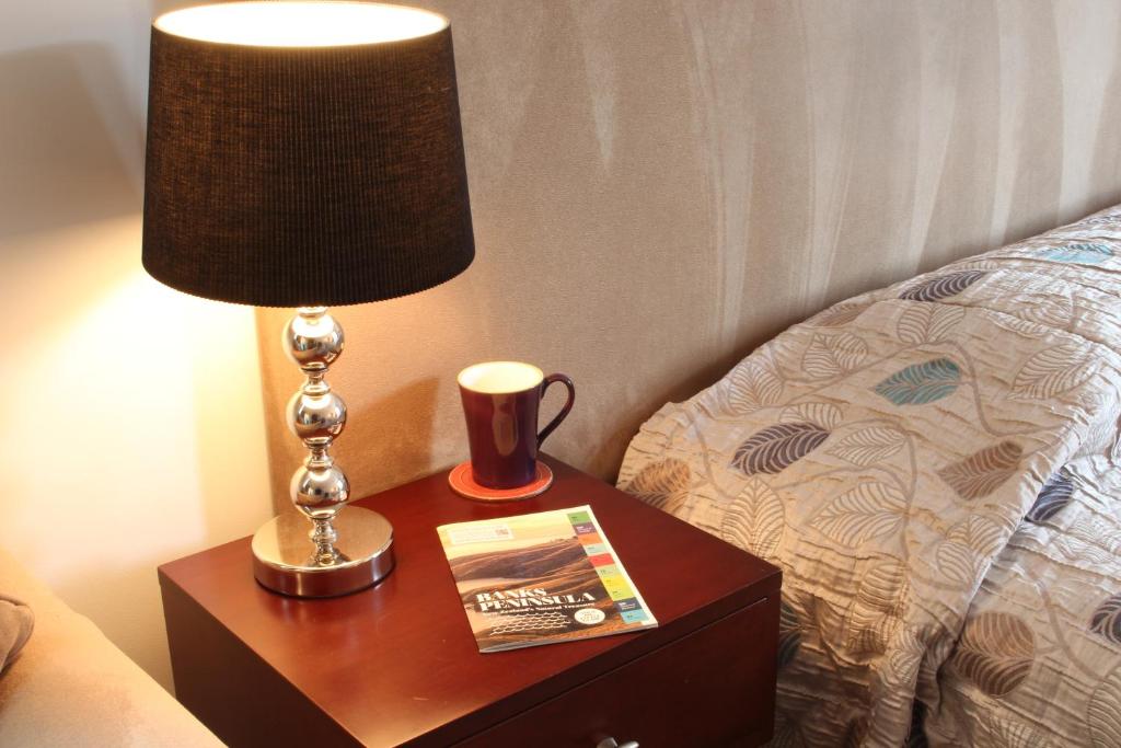 Postel nebo postele na pokoji v ubytování Tresori Motor Lodge