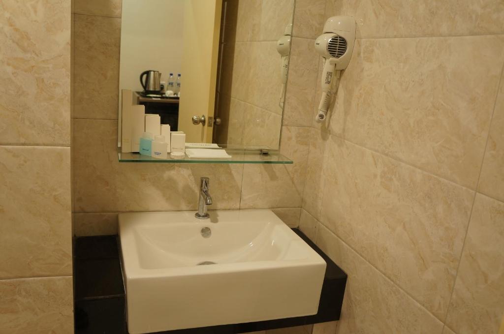 Koupelna v ubytování LABUAN JATI HOTEL
