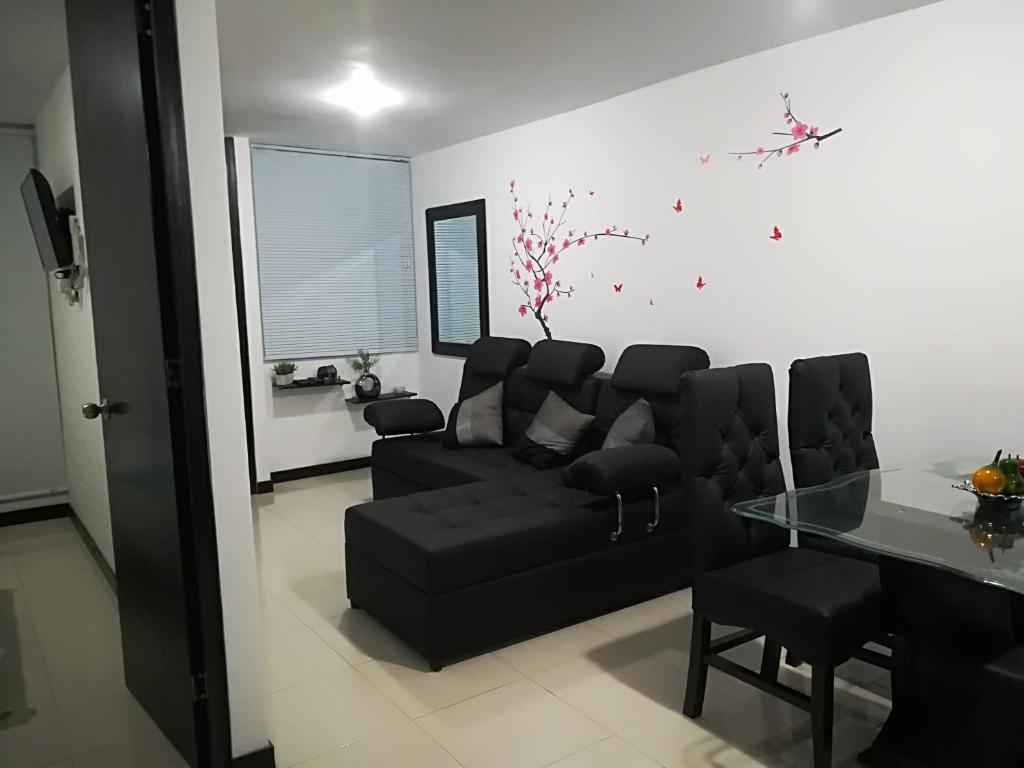 Posezení v ubytování Excelente Apto en Guaduales del Café a 5 minutos del parque del café (Montenegro)