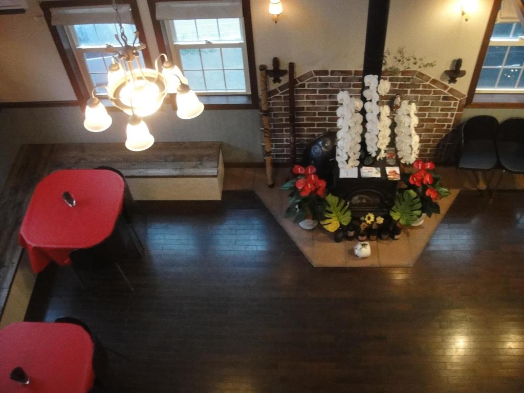 Area tempat duduk di IZA Kamakura Guest House and Bar