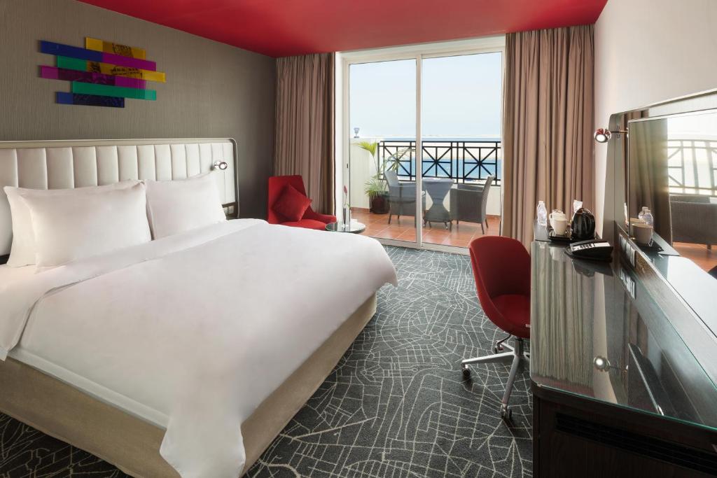 Postel nebo postele na pokoji v ubytování Park Inn by Radisson Dammam