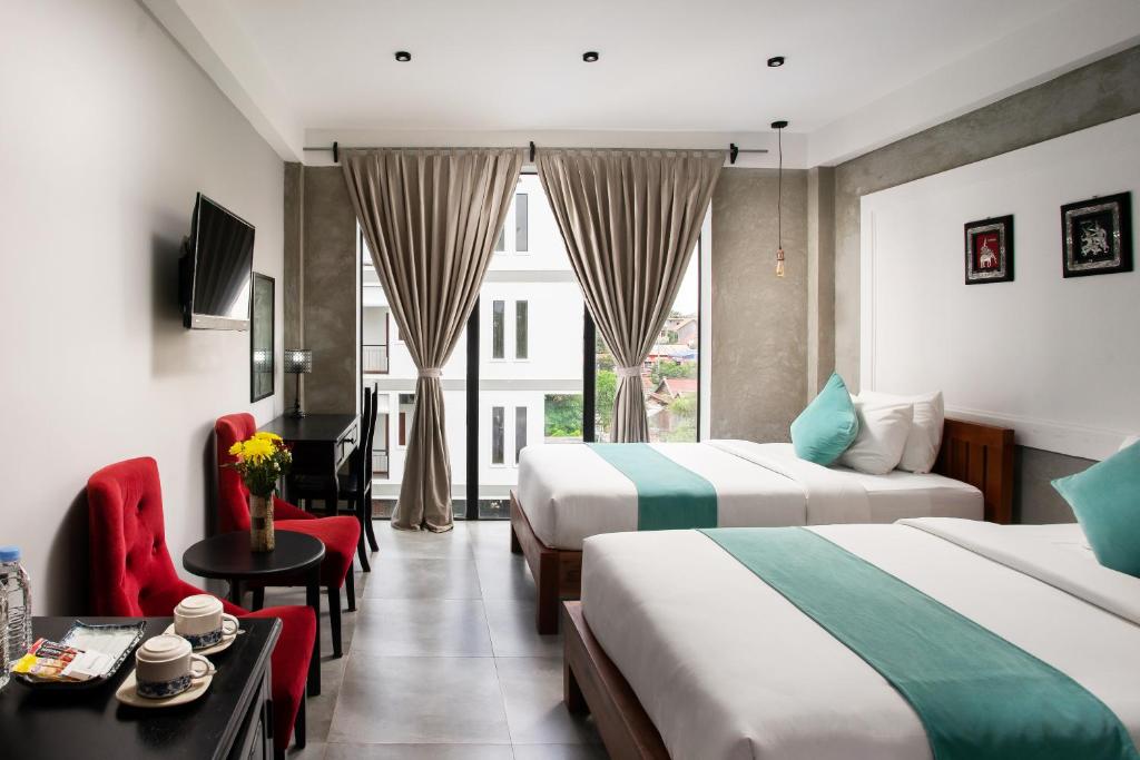 Postel nebo postele na pokoji v ubytování CENTRAL BLANCHE Residence