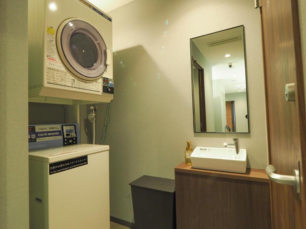 Fotografie z fotogalerie ubytování Leo Yu Capsule Hotel Funabashi v destinaci Funabaši