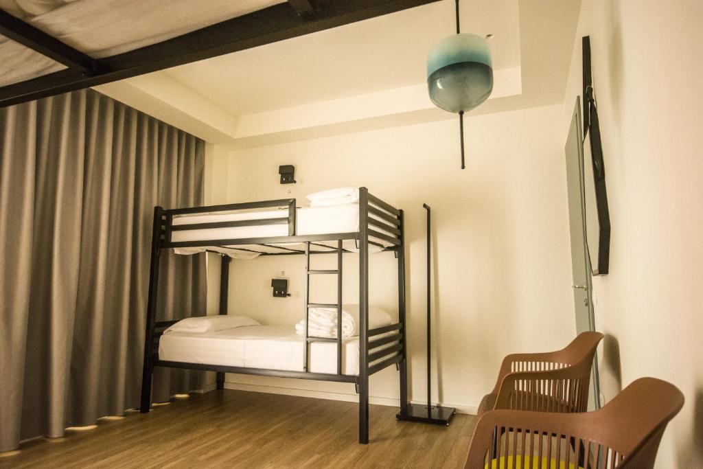 Postel nebo postele na pokoji v ubytování Vanilla Sky Boutique Hostel