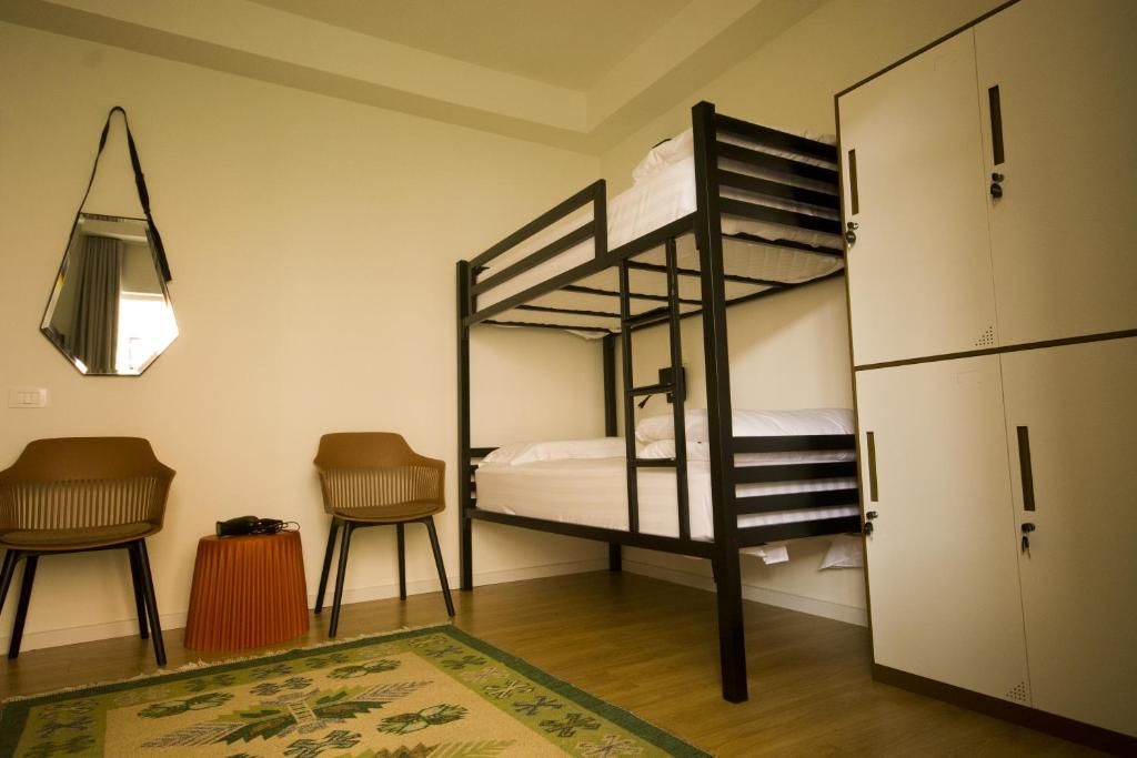 Postel nebo postele na pokoji v ubytování Vanilla Sky Boutique Hostel