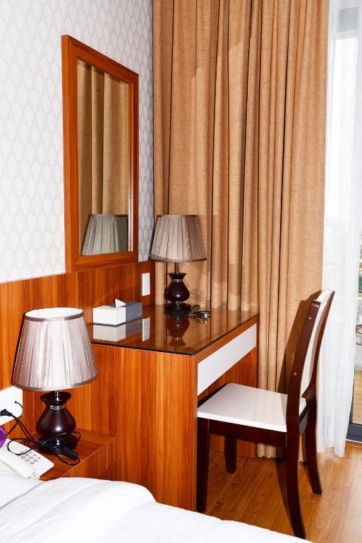 Postel nebo postele na pokoji v ubytování Con Khuong Resort Can Tho