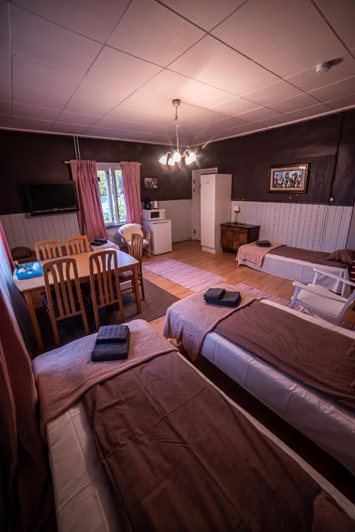 Postel nebo postele na pokoji v ubytování Arctic Guesthouse & Igloos