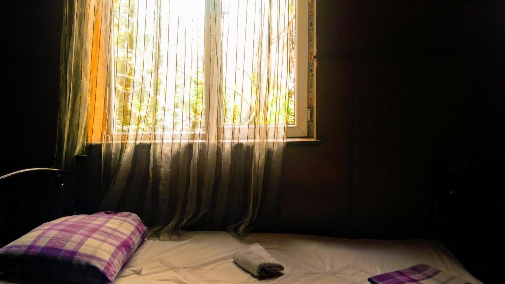 Postel nebo postele na pokoji v ubytování Colibri Home