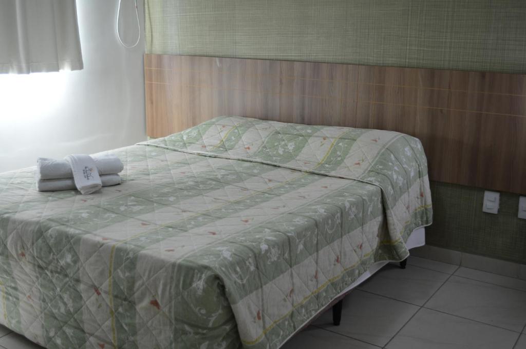 Cama ou camas em um quarto em Rio das Pedras Thermas Hotel