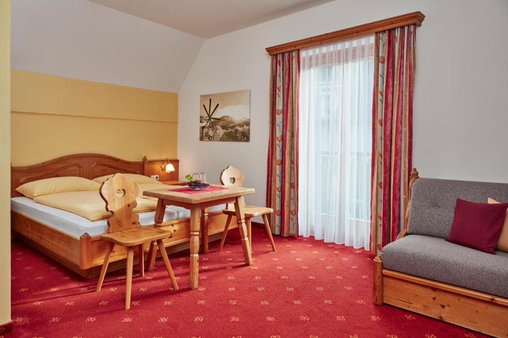Posteľ alebo postele v izbe v ubytovaní Hotel Domittner