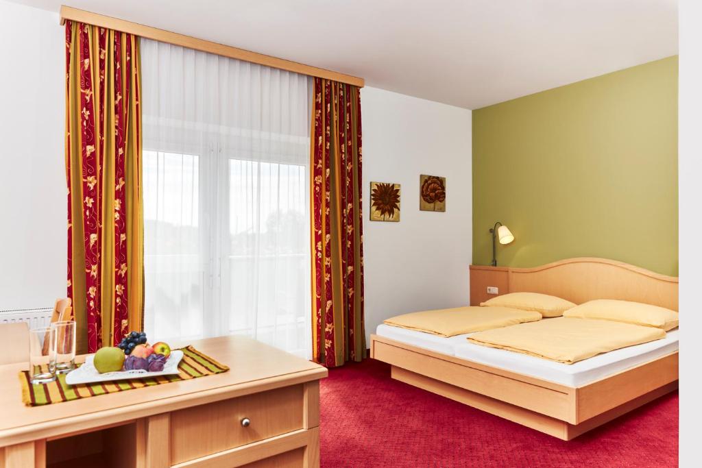 Posteľ alebo postele v izbe v ubytovaní Hotel Domittner