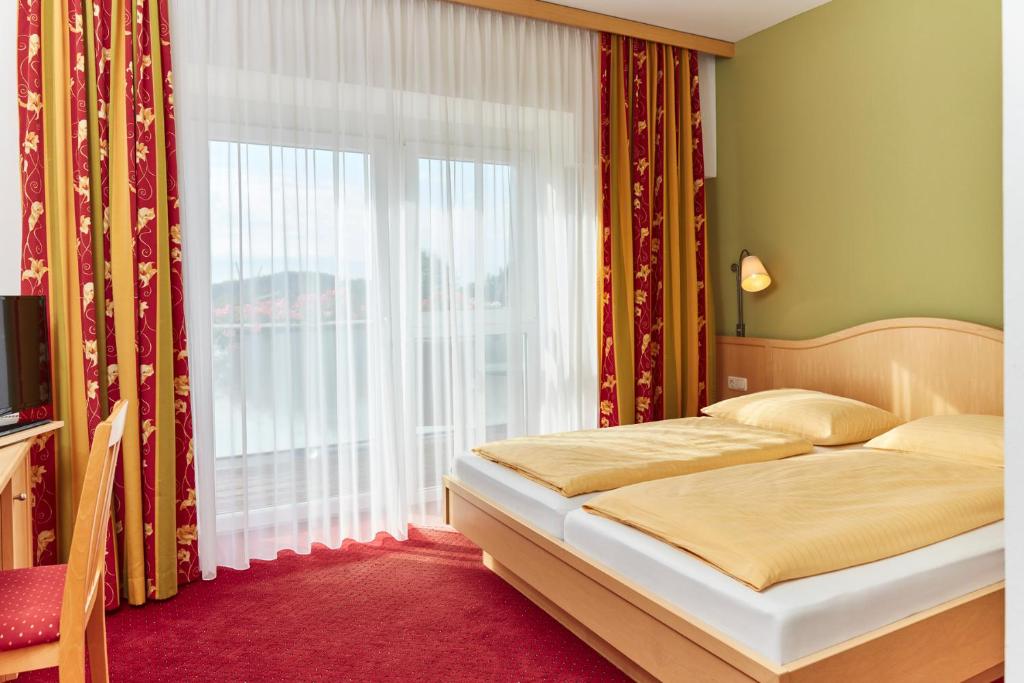 Posteľ alebo postele v izbe v ubytovaní Hotel Domittner