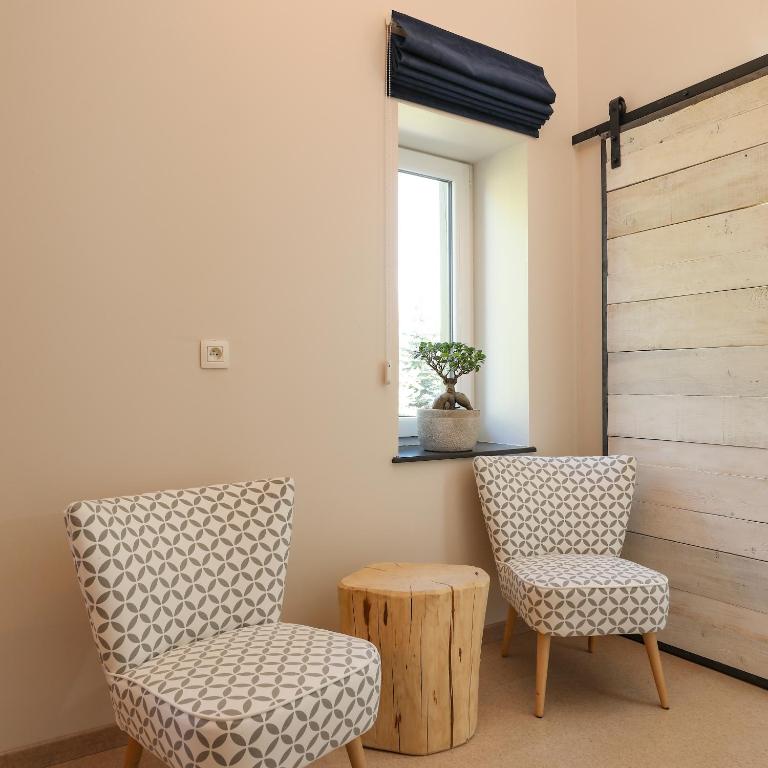 Posezení v ubytování Le Sorbier - Gîte et chambres d'hôtes