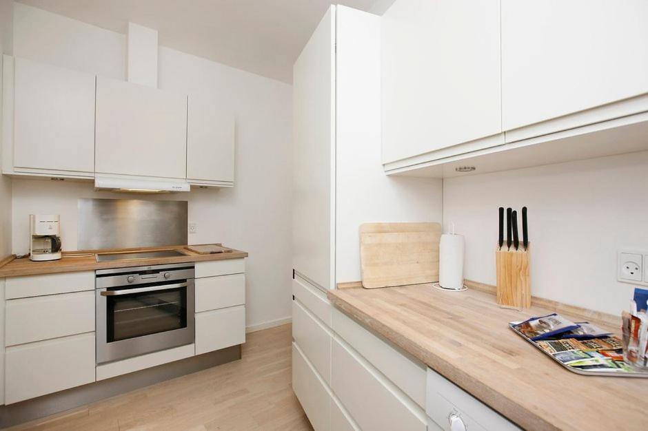Kuchyň nebo kuchyňský kout v ubytování Hotel 9 små hjem