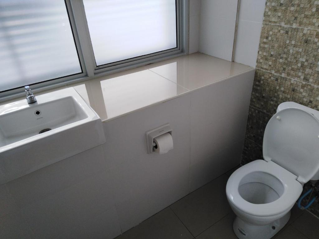 Koupelna v ubytování 1ACS Residence