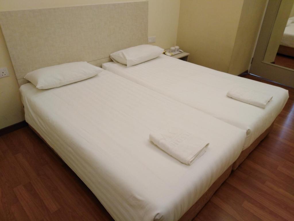 Postel nebo postele na pokoji v ubytování 1ACS Residence