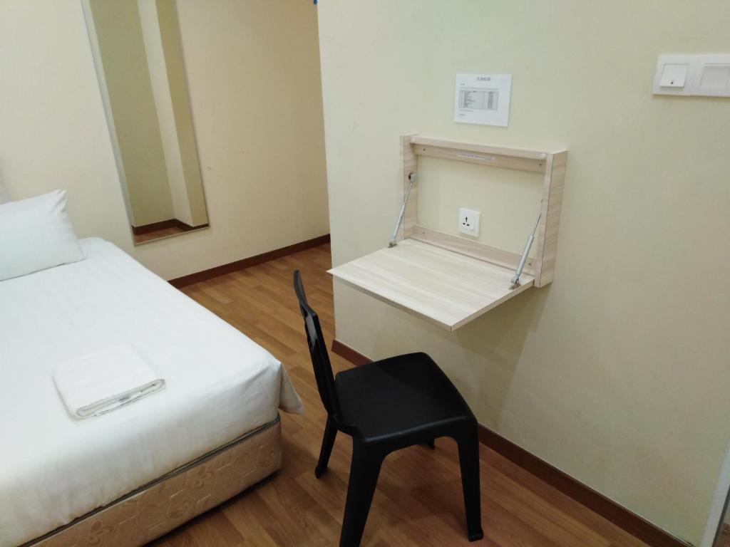 Postel nebo postele na pokoji v ubytování 1ACS Residence