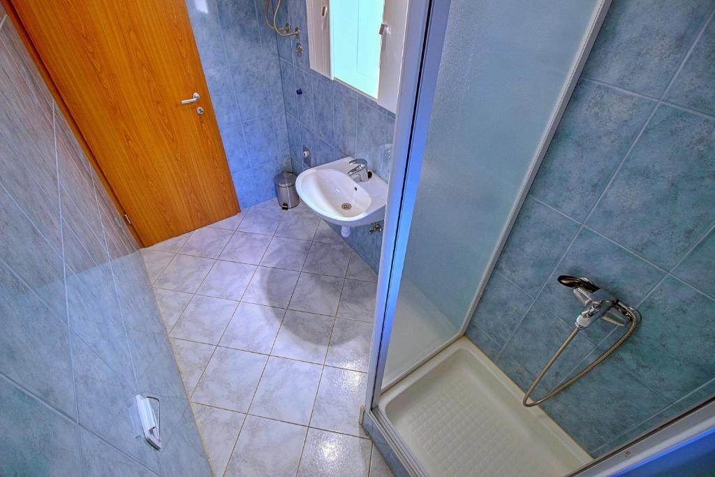 Kúpeľňa v ubytovaní Apartment Milana