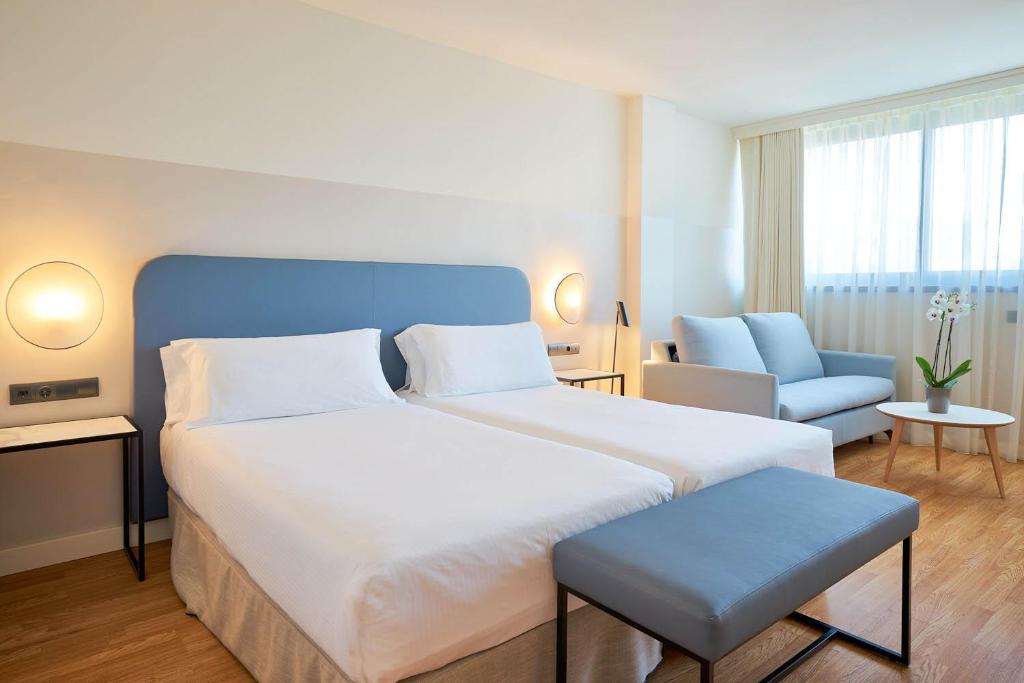Cama o camas de una habitación en Eurostars Málaga