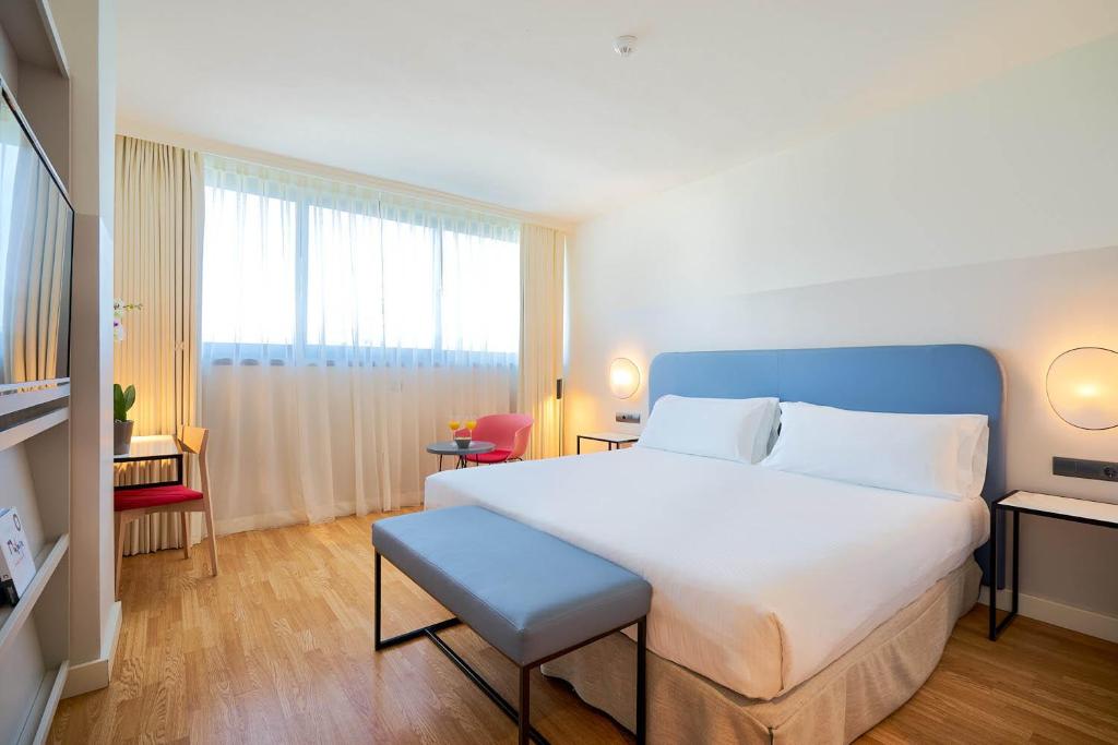Posteľ alebo postele v izbe v ubytovaní Eurostars Málaga