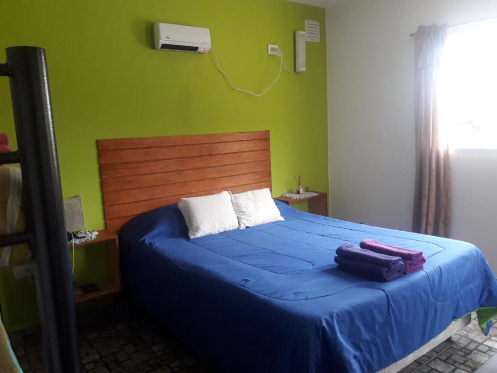 Katil atau katil-katil dalam bilik di Hospedaje Vista al Mar