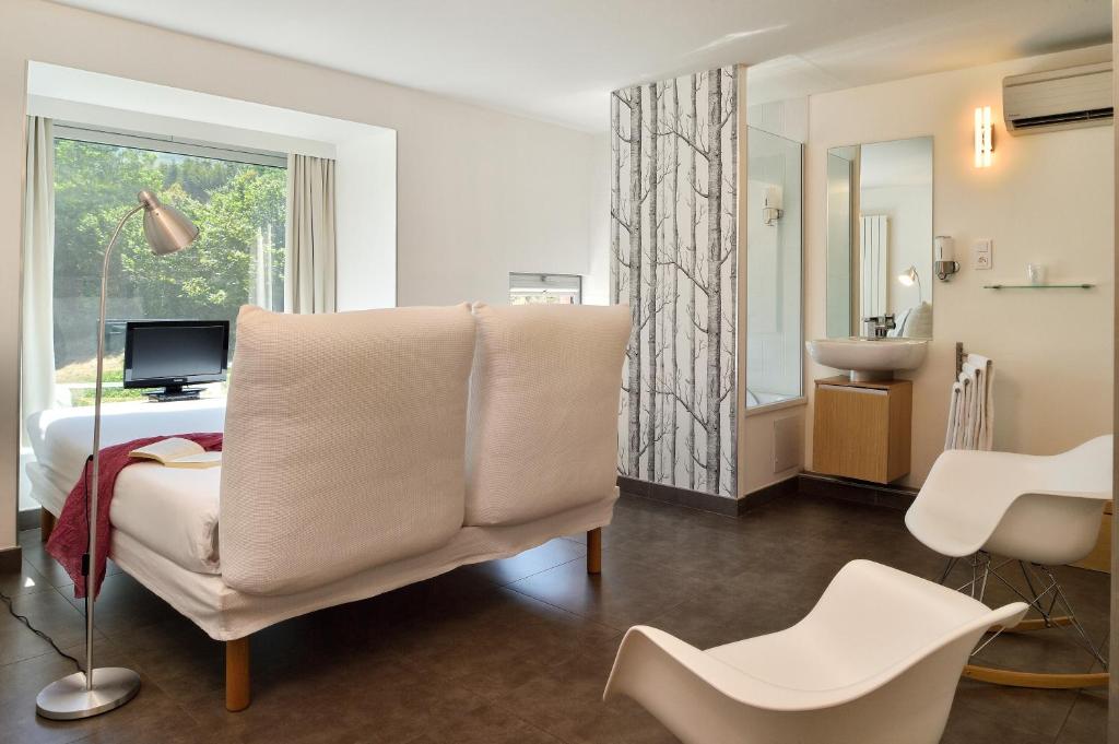 TV a/nebo společenská místnost v ubytování Boutique Hotel Artemisia