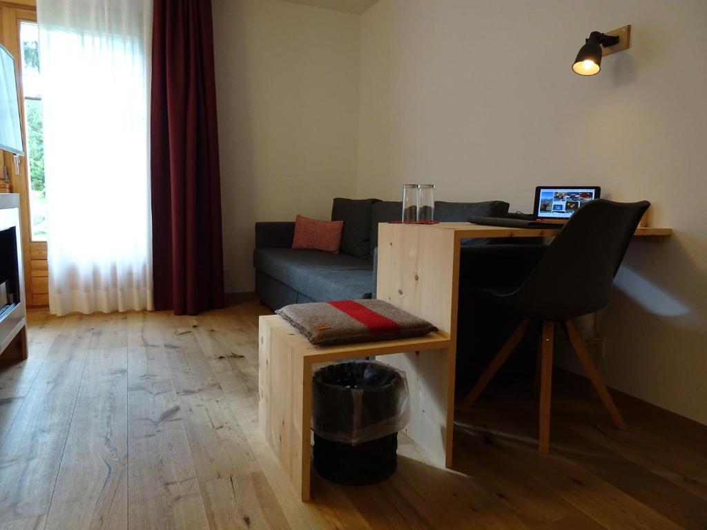 TV a/nebo společenská místnost v ubytování Schorta's Alvetern - Boutique Hotel & Restaurant