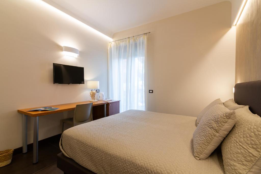 TV a/nebo společenská místnost v ubytování Il Melograno Relais