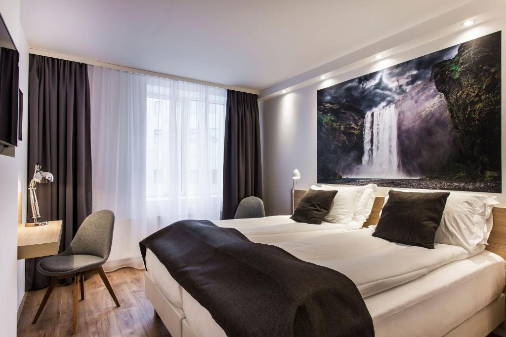 Postel nebo postele na pokoji v ubytování Storm Hotel by Keahotels