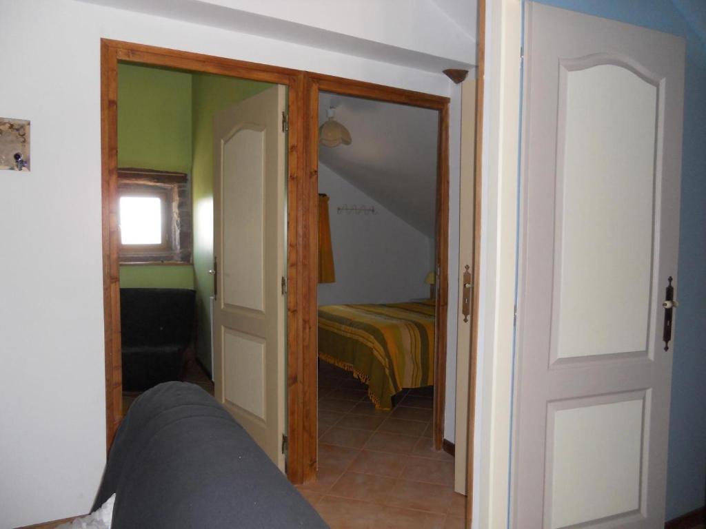 Postel nebo postele na pokoji v ubytování Gîte des Monts