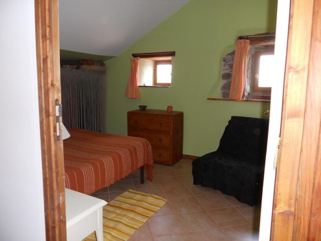 Postel nebo postele na pokoji v ubytování Gîte des Monts